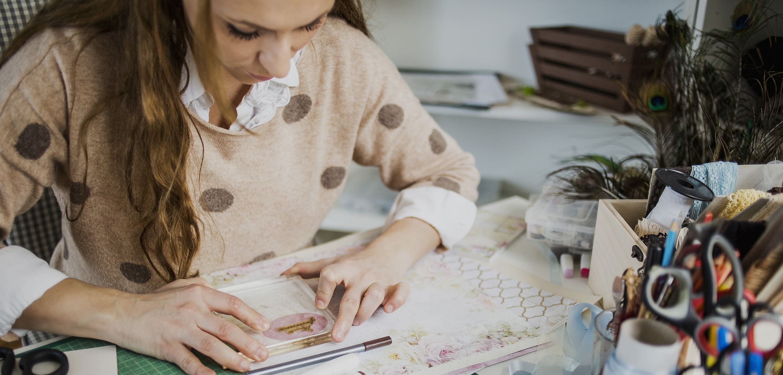 Lady working on scrapbook