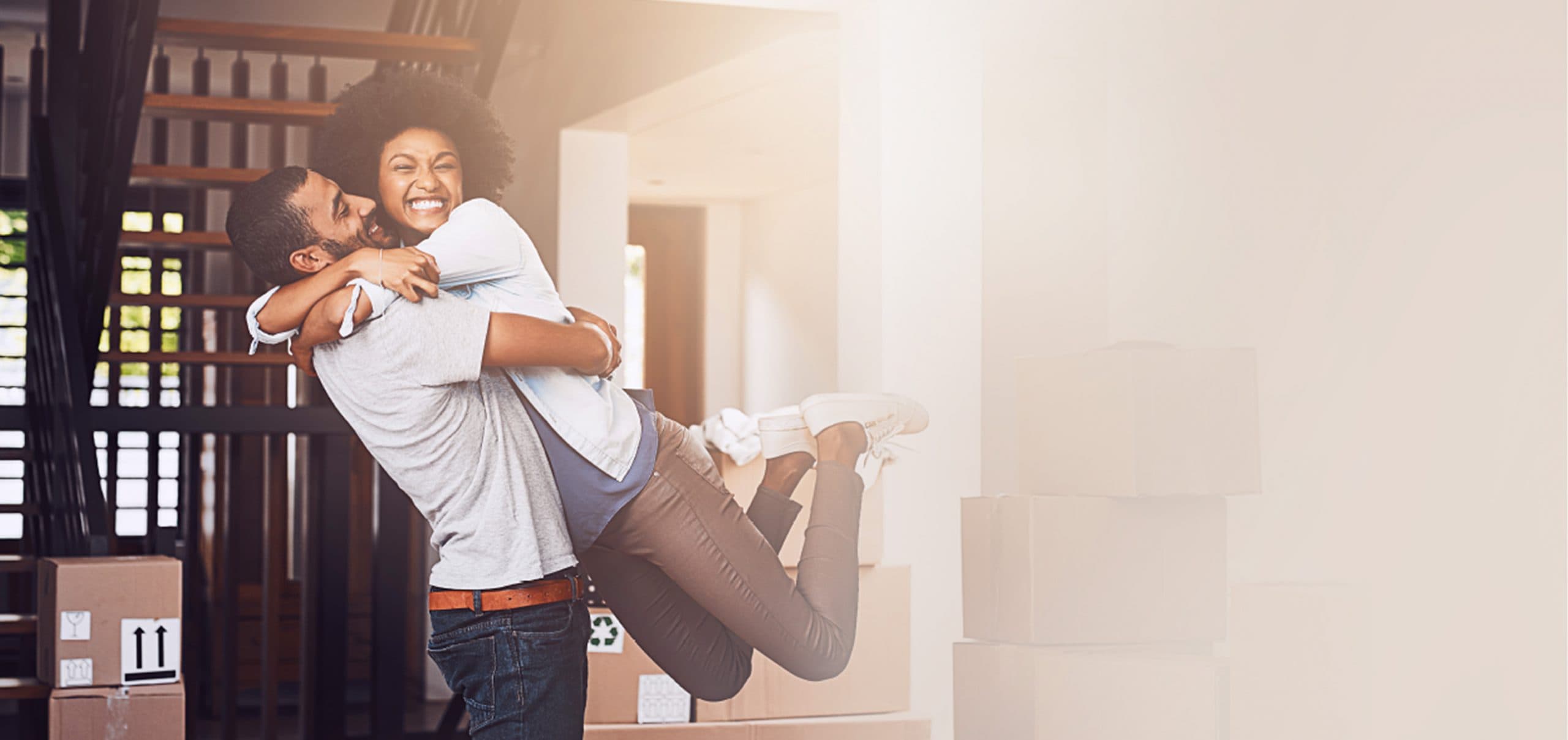 Happy couple moving