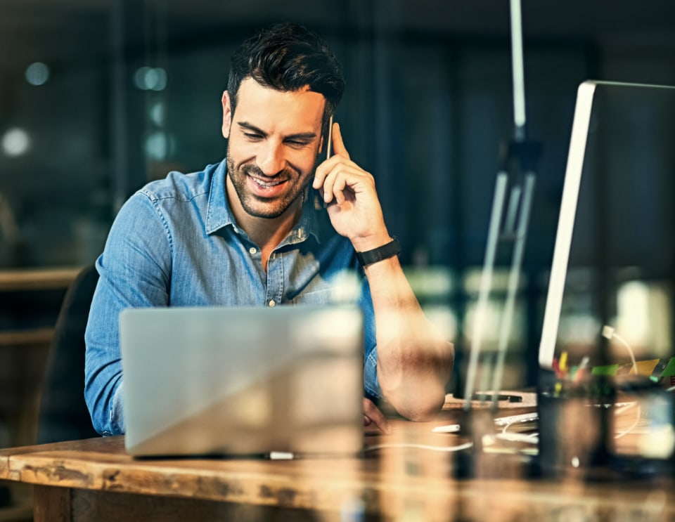 Salesman on phone with leads